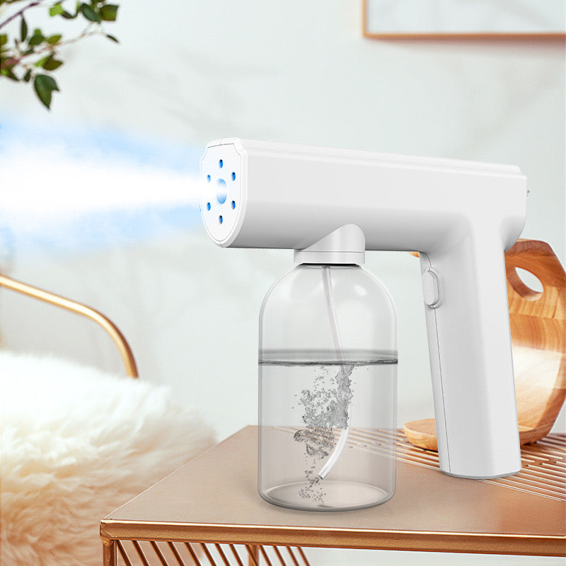 New wireless atomizing disinfection gun rechargeable nano spray electronic household blue light atomizer spray